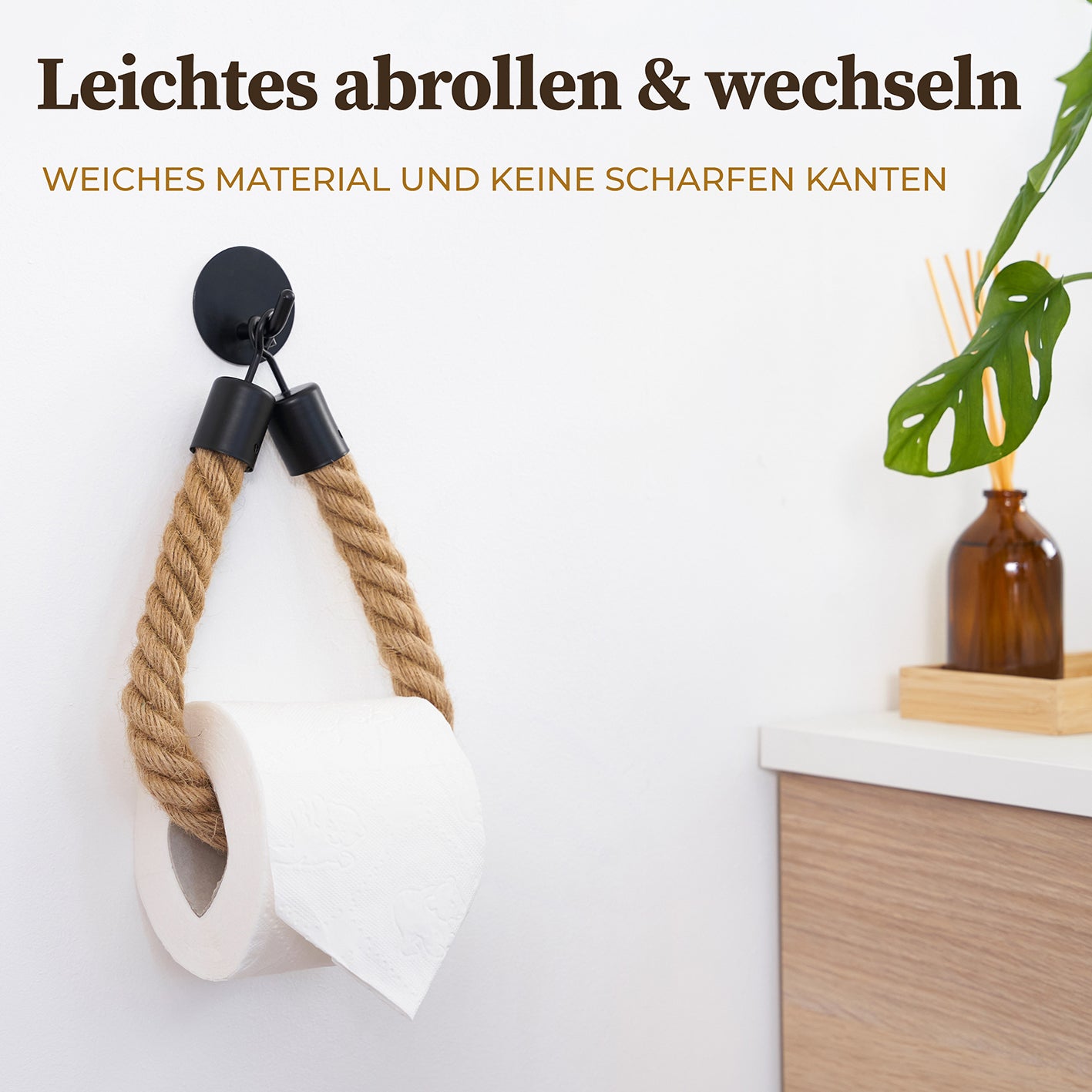 Toilettenpapierhalter ohne Bohren - Mattschwarz aus Jute und Metall, einfach montierbar, stilvoll und funktional im modernen Bad.