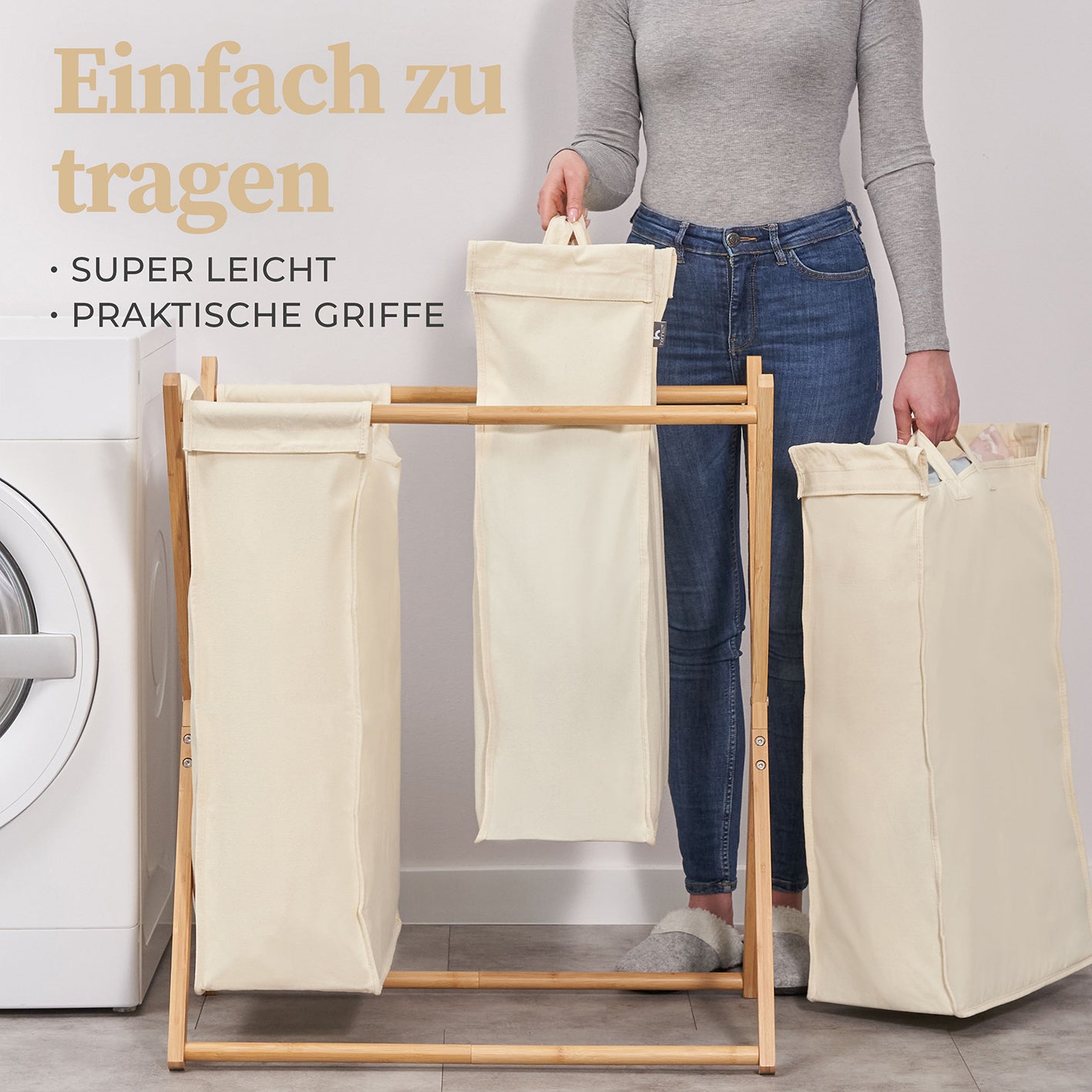 Wäschesammler "Xavier" 150 l - 3 Fächer - Beige mit Bambusgestell und praktischen Griffen zum einfachen Tragen der Wäsche.