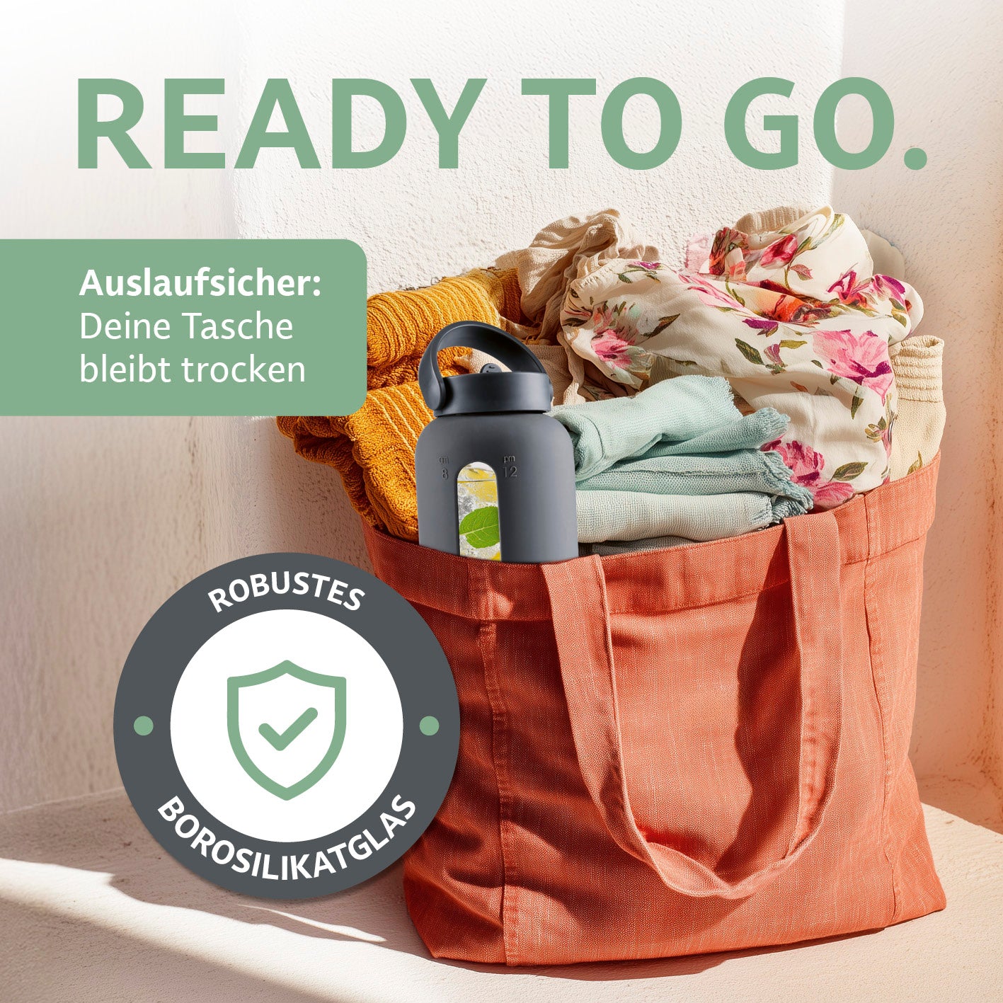 Glas-Trinkflasche – Anthrazit aus robustem Borosilikatglas mit Auslaufschutz, ideal für unterwegs in Tasche mit Kleidung