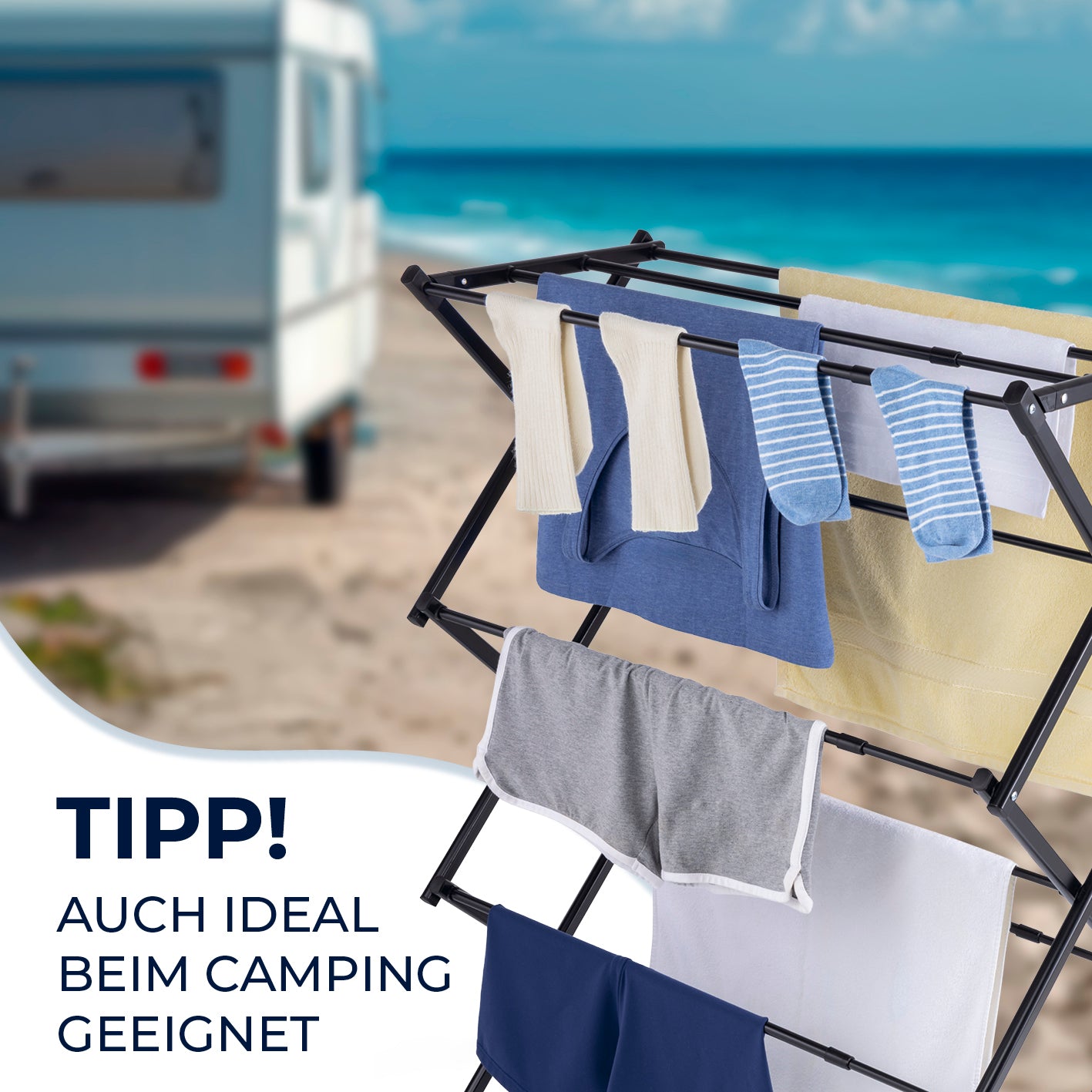 Teleskop-Wäscheständer 1200 im Einsatz am Strand beim Camping, kompakt und flexibel zum Trocknen von Kleidung.