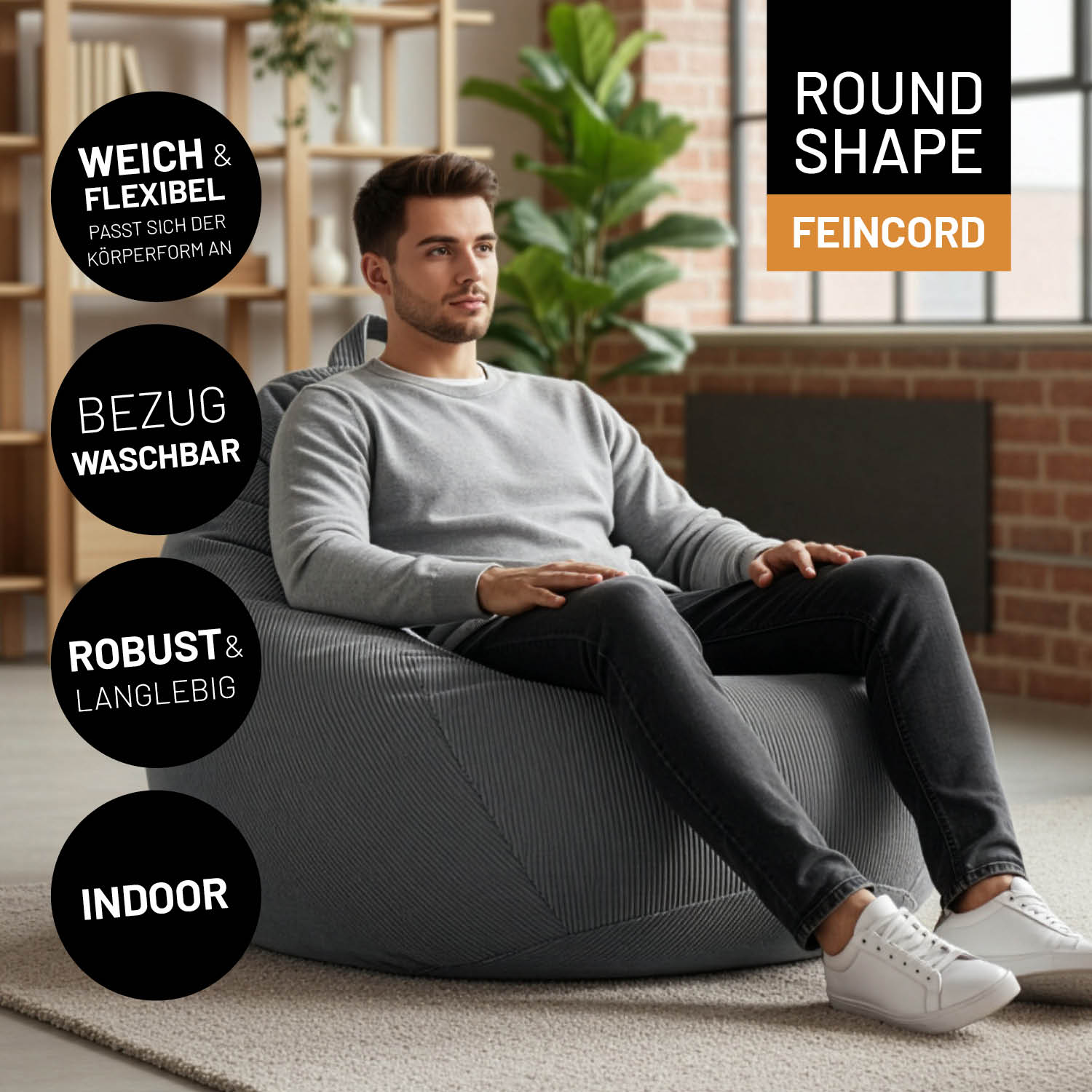 Mann sitzt entspannt auf Comfort Line Sitzsack Feincord XXL - 315 L - Grau, weicher, flexibler und robuster Indoor Sitzsack.