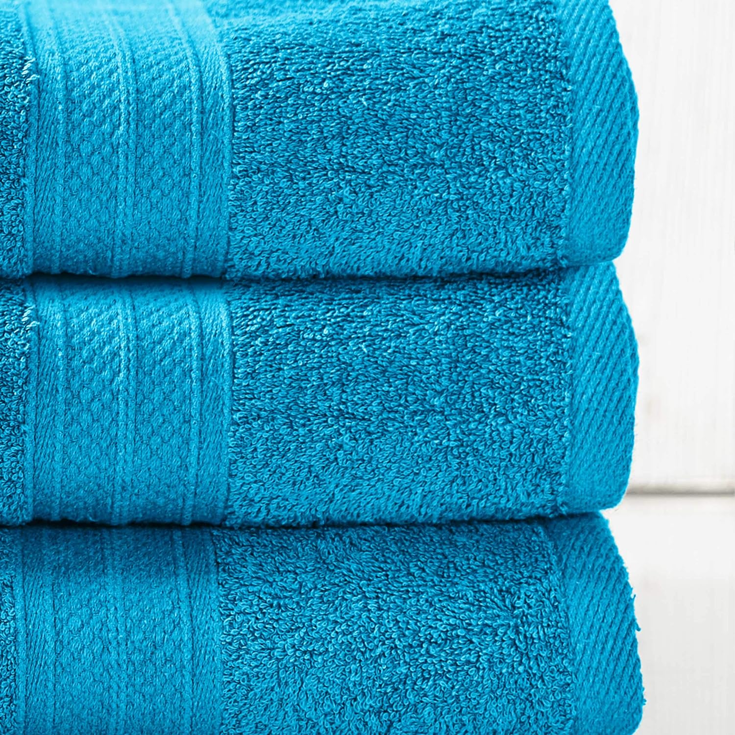 Premium Handtuch-Set - 2 Handtücher (50 x 100 cm) + 2 Badetücher (70 x 140 cm) in Türkis, weich und saugfähig aus 100 % Baumwolle.