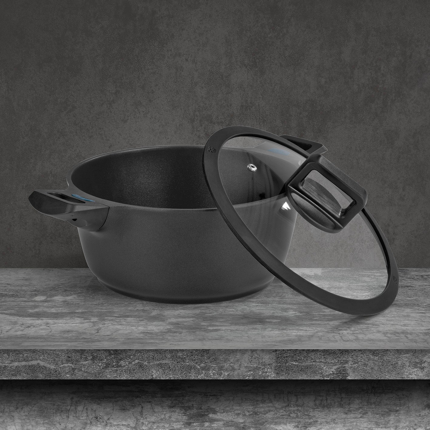 Aluguss-Kochtopf 24 cm - N8WERK Heat Indicator - Midnight Edition mit Deckel und Silikon-Umrandung, für alle Herdarten geeignet.