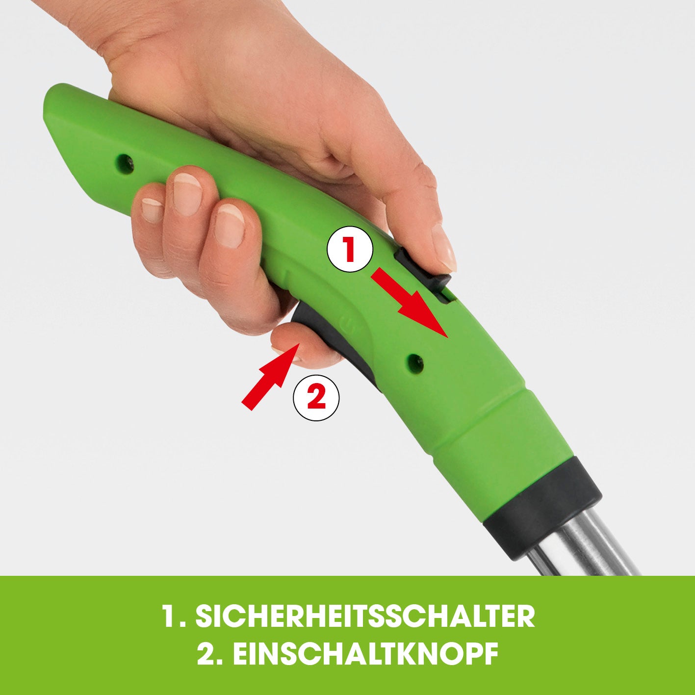 Akku-Rasentrimmer mit grünem Griff, Sicherheitschalter und Einschaltknopf für einfache und sichere Bedienung.