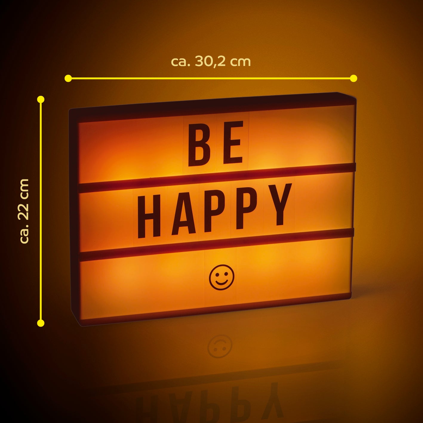 LED-Leuchtkasten A4 mit 173 Buchstaben, Zahlen & Symbolen zeigt "BE HAPPY" auf leuchtender Schriftplatte mit 3 Zeilen und Smiley-Symbol.