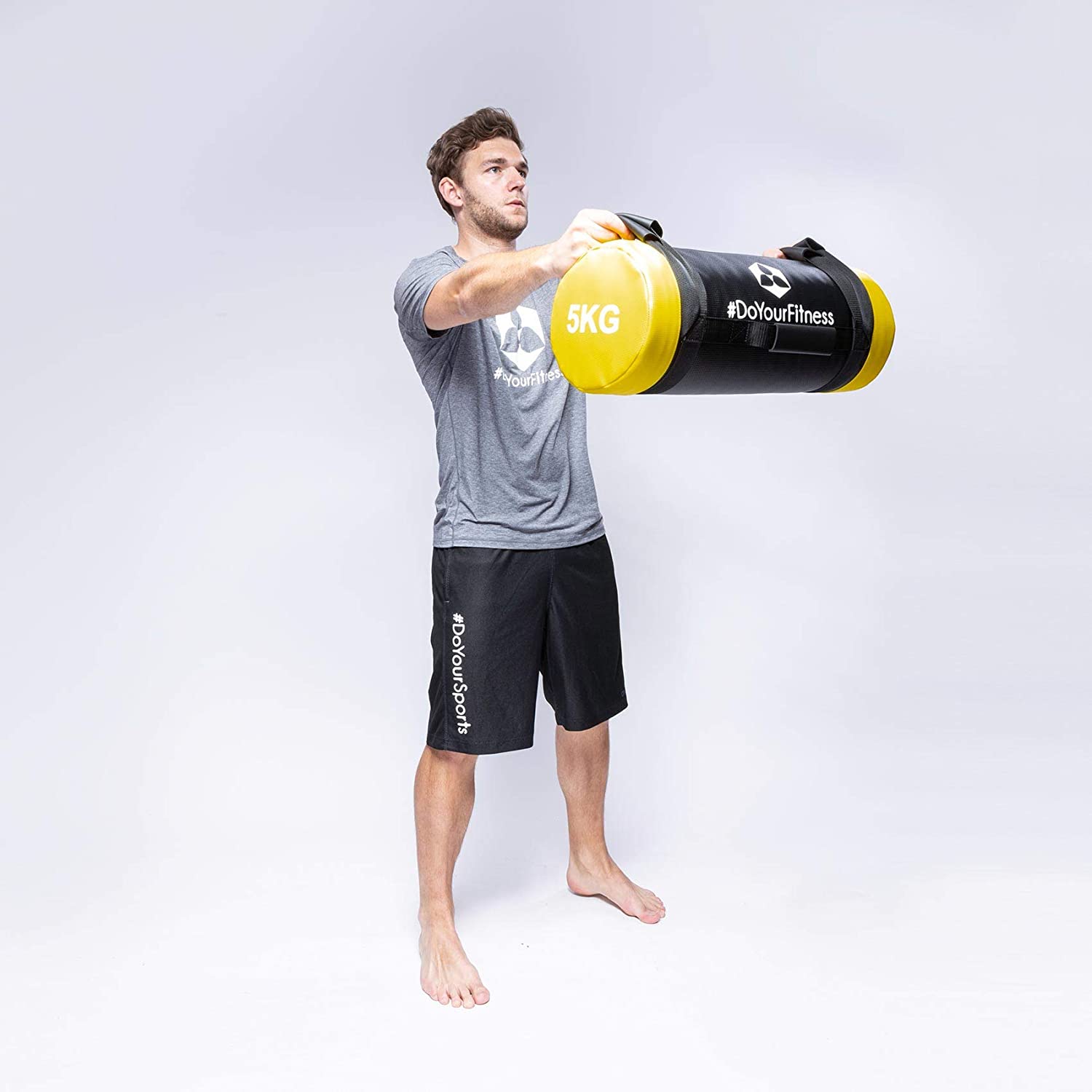 Corebag Sandsack Carolous - Fitness Power Bag 5kg in Gebrauch für Functional Training und Stabilitätsübungen im Sport.