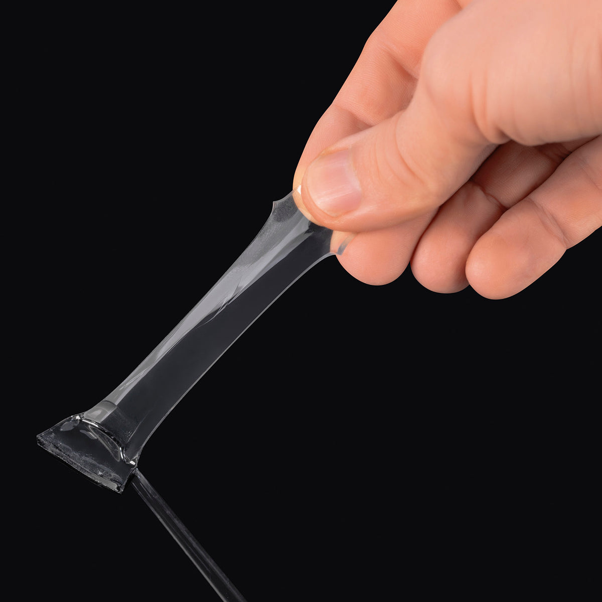 Spurenloses Klebeband - 5 m - 2er-Set transparentes Klebeband wird von Hand abgezogen