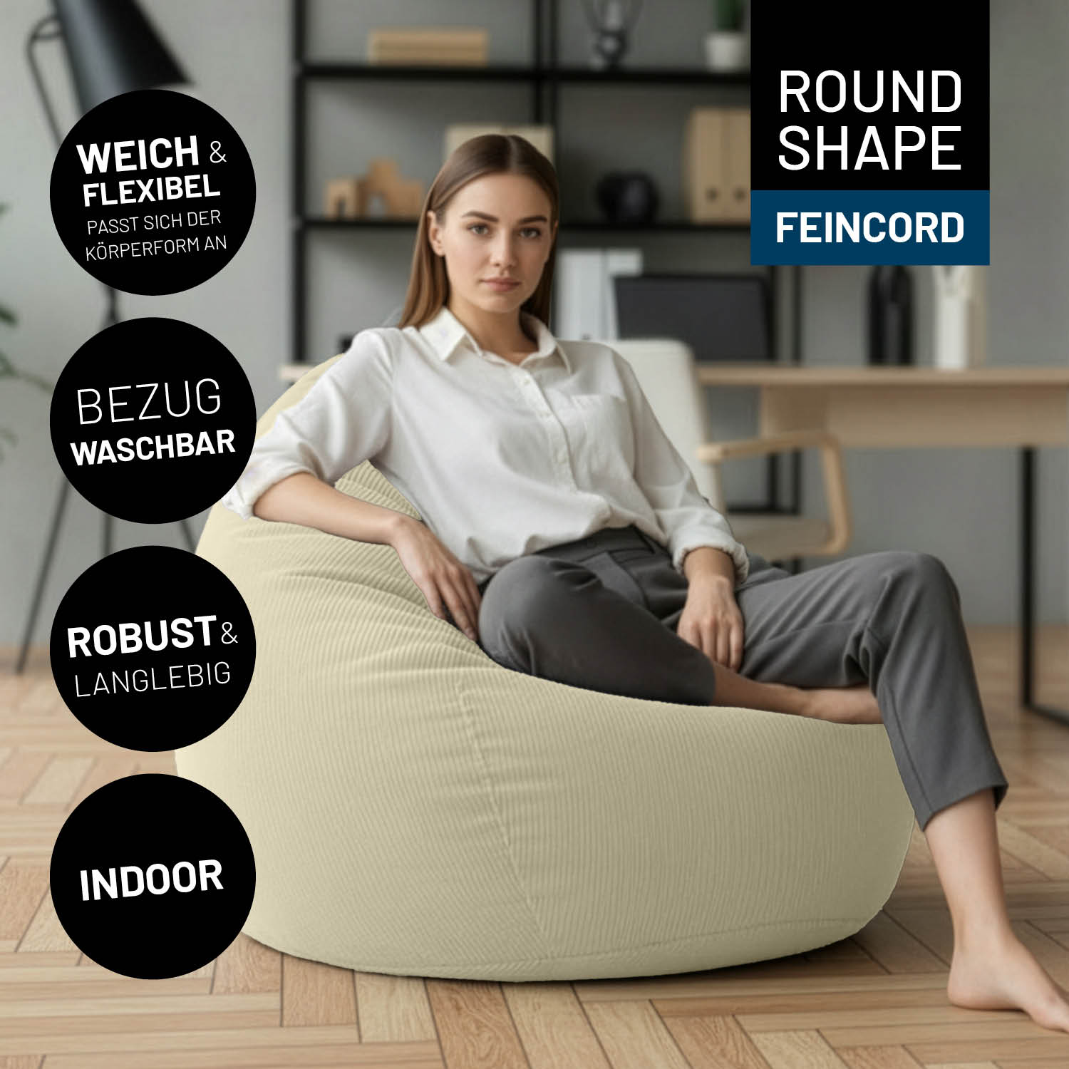 Frau sitzt entspannt auf dem Comfort Line Sitzsack Feincord XL - 250 L - Beige in modernem Wohnzimmer, weich und flexibel.